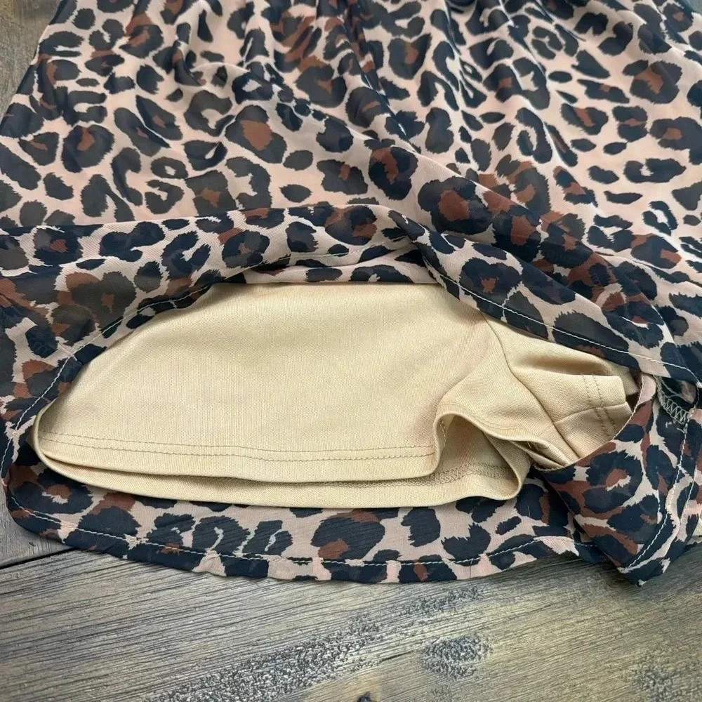 Excellent condition Show Me Your Mumu cheetah print shorts romper. Medium.